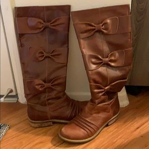 Anthropologie Tall brown leather boots with bows